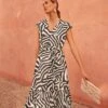 Zalaya Zebra Print Maxi Dress 1 Zalaya Zebra Print Maxi Dress -Floral Und Chic 221017000 01 zalaya zebra print maxi dress